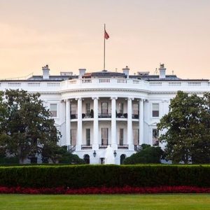 White House south lawn with sun fading behind